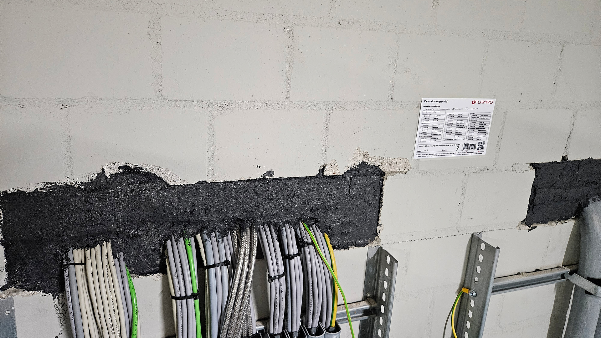 Completed soft seal for cable penetrations in fire wall 07 at Sweet Tec